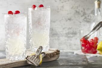 Non-alcoholic Tom Collins with cocktail cherries