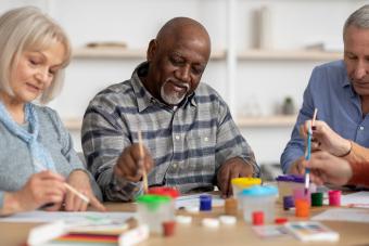 Senior and family painting