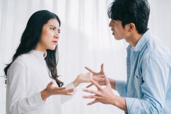 Man and woman having a tense conversation