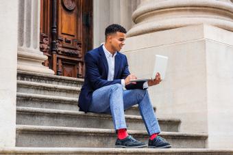 https://cf.ltkcdn.net/www/images/slide/358443-850x567-African-American-wearing-blazer-gray-pants-red-socks-sneakers-536167795.jpg