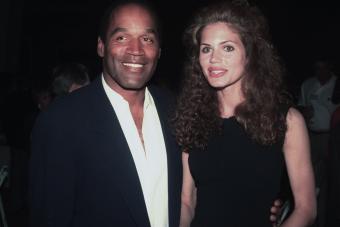 Los Angeles - circa 1993: O.J. Simpson and his girlfriend Paula Barbieri leave Chasen's restaurant.